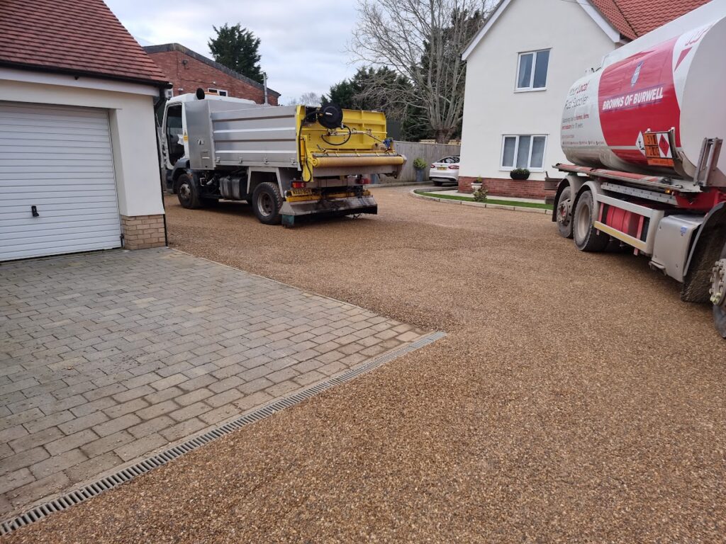 This is a photo of a tar and chip driveway that has been constructed by Anglia Tar & Chip Surfacing